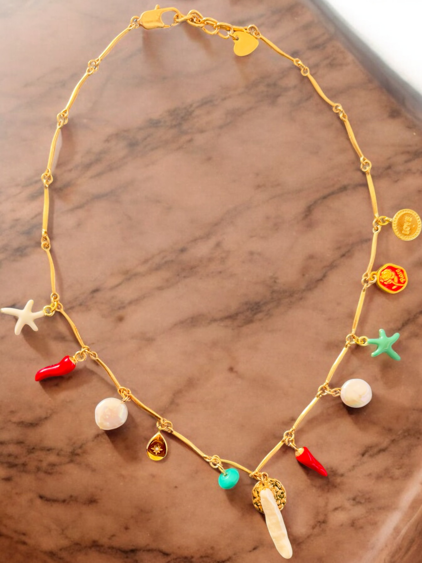 COLLIER GINA